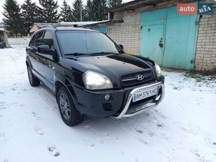 Черный Хендай Туксон, объемом двигателя 2 л и пробегом 260 тыс. км за 7900 $, фото 1 на Automoto.ua