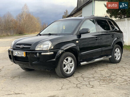 Черный Хендай Туксон, объемом двигателя 2 л и пробегом 220 тыс. км за 8200 $, фото 1 на Automoto.ua