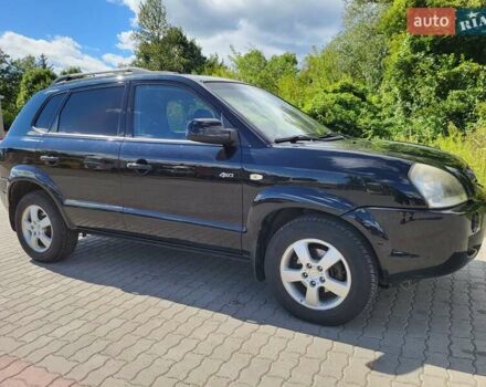 Чорний Хендай Туксон, об'ємом двигуна 2 л та пробігом 218 тис. км за 8500 $, фото 1 на Automoto.ua