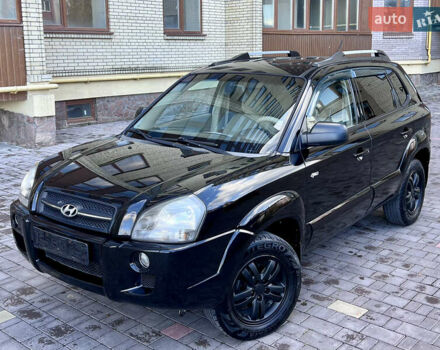 Черный Хендай Туксон, объемом двигателя 2 л и пробегом 176 тыс. км за 6850 $, фото 1 на Automoto.ua