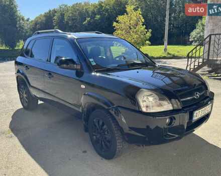 Черный Хендай Туксон, объемом двигателя 2 л и пробегом 189 тыс. км за 8250 $, фото 1 на Automoto.ua