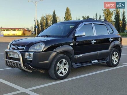 Черный Хендай Туксон, объемом двигателя 2 л и пробегом 280 тыс. км за 6700 $, фото 1 на Automoto.ua