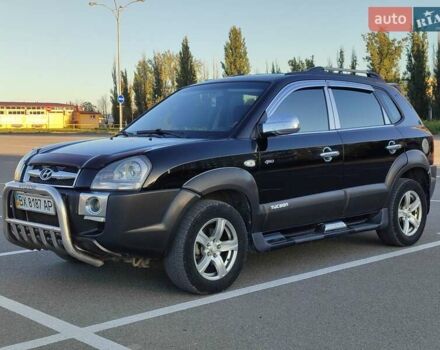 Черный Хендай Туксон, объемом двигателя 2 л и пробегом 280 тыс. км за 6700 $, фото 1 на Automoto.ua