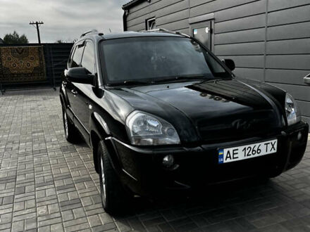 Чорний Хендай Туксон, об'ємом двигуна 2 л та пробігом 253 тис. км за 9428 $, фото 1 на Automoto.ua
