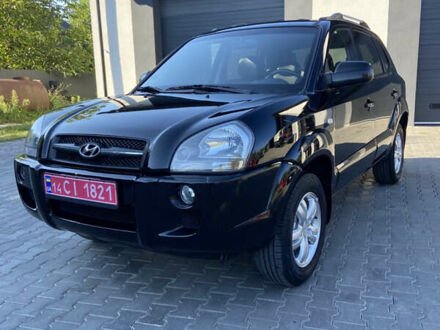 Черный Хендай Туксон, объемом двигателя 1.98 л и пробегом 197 тыс. км за 8000 $, фото 1 на Automoto.ua