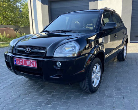 Черный Хендай Туксон, объемом двигателя 1.98 л и пробегом 197 тыс. км за 8000 $, фото 1 на Automoto.ua