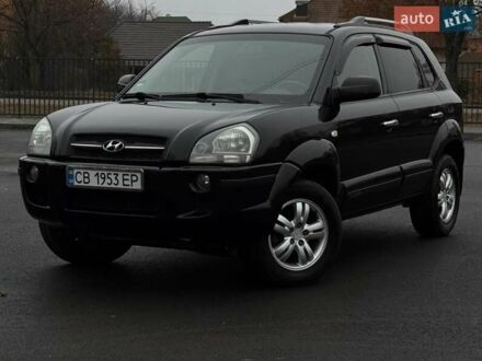 Черный Хендай Туксон, объемом двигателя 1.98 л и пробегом 217 тыс. км за 7950 $, фото 1 на Automoto.ua