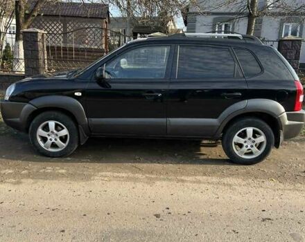 Черный Хендай Туксон, объемом двигателя 1.99 л и пробегом 302 тыс. км за 6900 $, фото 1 на Automoto.ua