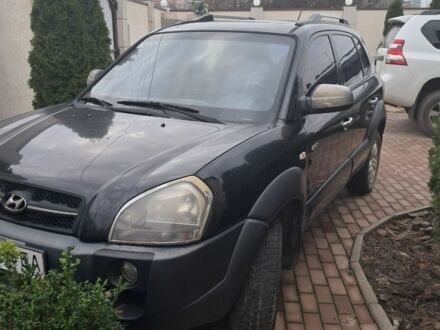 Чорний Хендай Туксон, об'ємом двигуна 2 л та пробігом 400 тис. км за 7000 $, фото 1 на Automoto.ua