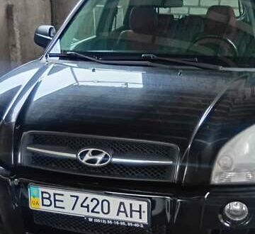 Черный Хендай Туксон, объемом двигателя 1.98 л и пробегом 218 тыс. км за 7800 $, фото 1 на Automoto.ua