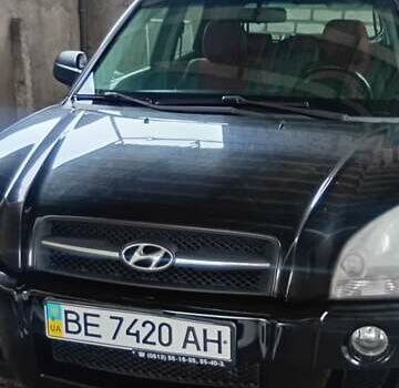 Черный Хендай Туксон, объемом двигателя 1.98 л и пробегом 218 тыс. км за 7800 $, фото 1 на Automoto.ua