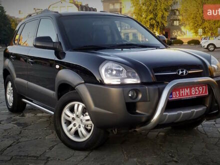 Чорний Хендай Туксон, об'ємом двигуна 2 л та пробігом 230 тис. км за 8600 $, фото 1 на Automoto.ua
