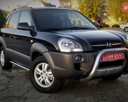 Черный Хендай Туксон, объемом двигателя 2 л и пробегом 230 тыс. км за 8600 $, фото 1 на Automoto.ua