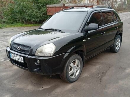 Черный Хендай Туксон, объемом двигателя 2 л и пробегом 260 тыс. км за 8150 $, фото 1 на Automoto.ua