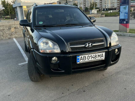 Черный Хендай Туксон, объемом двигателя 1.98 л и пробегом 267 тыс. км за 8100 $, фото 1 на Automoto.ua
