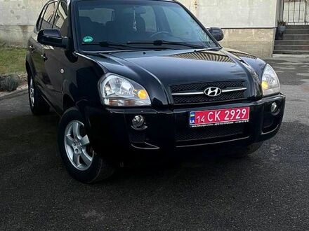 Черный Хендай Туксон, объемом двигателя 2 л и пробегом 211 тыс. км за 7800 $, фото 1 на Automoto.ua