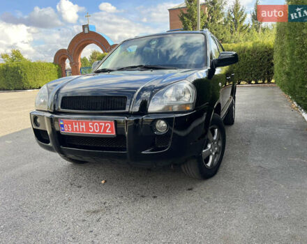 Черный Хендай Туксон, объемом двигателя 2 л и пробегом 256 тыс. км за 7800 $, фото 1 на Automoto.ua