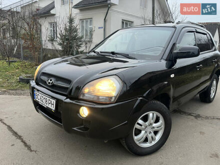 Черный Хендай Туксон, объемом двигателя 1.99 л и пробегом 268 тыс. км за 7650 $, фото 1 на Automoto.ua