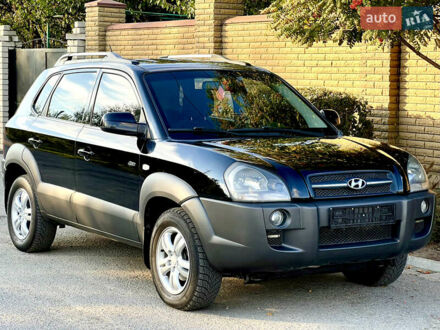 Черный Хендай Туксон, объемом двигателя 2 л и пробегом 167 тыс. км за 7800 $, фото 1 на Automoto.ua