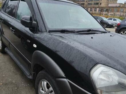 Чорний Хендай Туксон, об'ємом двигуна 2 л та пробігом 181 тис. км за 8300 $, фото 1 на Automoto.ua