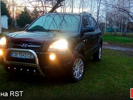 Черный Хендай Туксон, объемом двигателя 2 л и пробегом 179 тыс. км за 8300 $, фото 1 на Automoto.ua