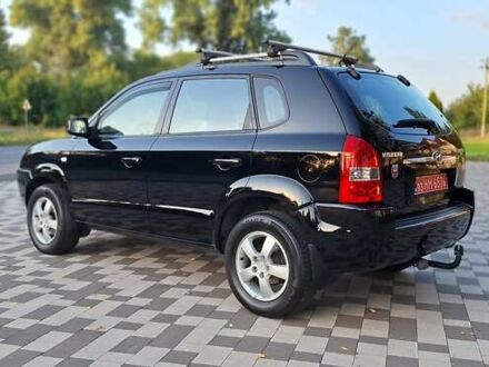 Черный Хендай Туксон, объемом двигателя 2 л и пробегом 190 тыс. км за 8150 $, фото 1 на Automoto.ua