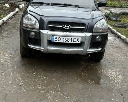Черный Хендай Туксон, объемом двигателя 1.98 л и пробегом 273 тыс. км за 7400 $, фото 1 на Automoto.ua