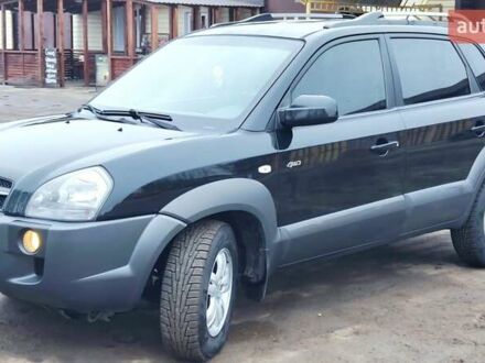 Чорний Хендай Туксон, об'ємом двигуна 2 л та пробігом 254 тис. км за 8199 $, фото 1 на Automoto.ua