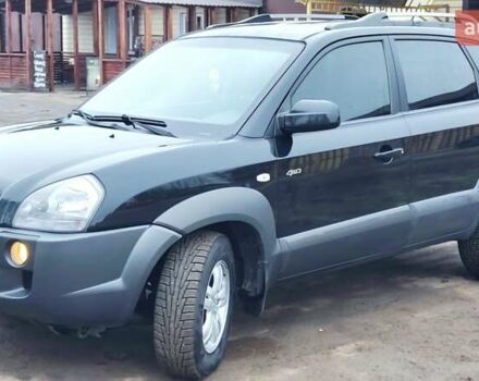 Черный Хендай Туксон, объемом двигателя 2 л и пробегом 254 тыс. км за 8199 $, фото 1 на Automoto.ua