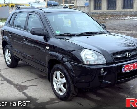 Черный Хендай Туксон, объемом двигателя 2 л и пробегом 192 тыс. км за 7900 $, фото 1 на Automoto.ua