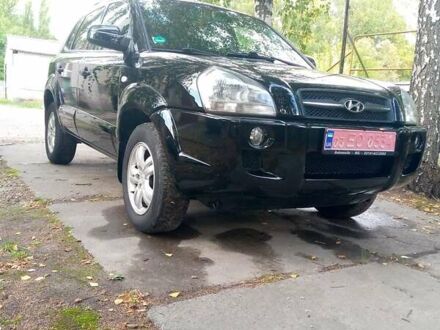 Чорний Хендай Туксон, об'ємом двигуна 2 л та пробігом 224 тис. км за 7900 $, фото 1 на Automoto.ua