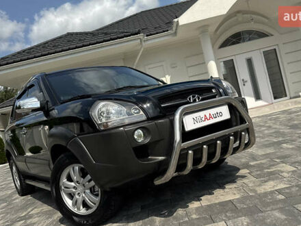 Черный Хендай Туксон, объемом двигателя 2 л и пробегом 67 тыс. км за 9999 $, фото 1 на Automoto.ua