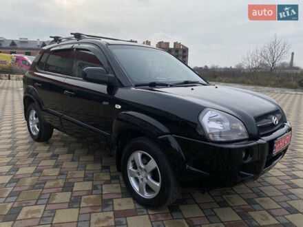 Черный Хендай Туксон, объемом двигателя 2 л и пробегом 209 тыс. км за 7999 $, фото 1 на Automoto.ua