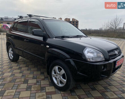 Черный Хендай Туксон, объемом двигателя 2 л и пробегом 209 тыс. км за 7999 $, фото 1 на Automoto.ua