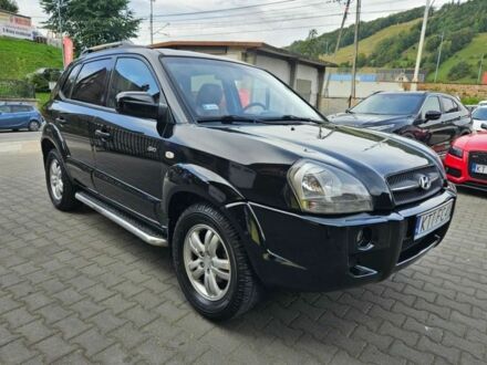 Черный Хендай Туксон, объемом двигателя 2 л и пробегом 287 тыс. км за 2400 $, фото 1 на Automoto.ua