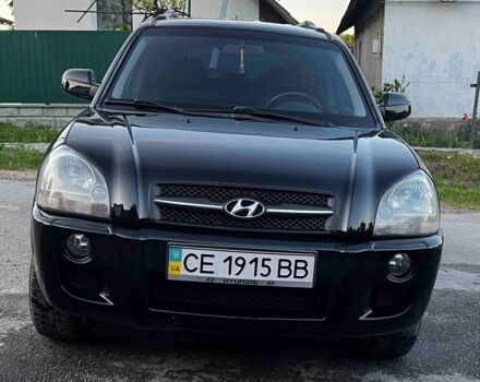 Чорний Хендай Туксон, об'ємом двигуна 2 л та пробігом 177 тис. км за 9200 $, фото 1 на Automoto.ua