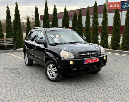 Черный Хендай Туксон, объемом двигателя 1.98 л и пробегом 205 тыс. км за 7950 $, фото 1 на Automoto.ua