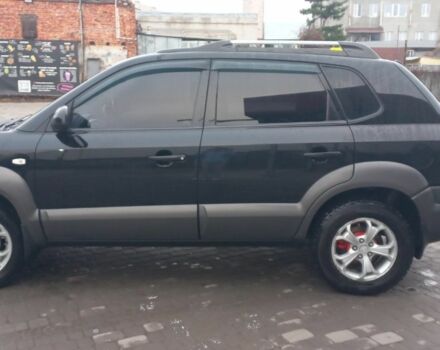 Чорний Хендай Туксон, об'ємом двигуна 2 л та пробігом 200 тис. км за 8300 $, фото 1 на Automoto.ua