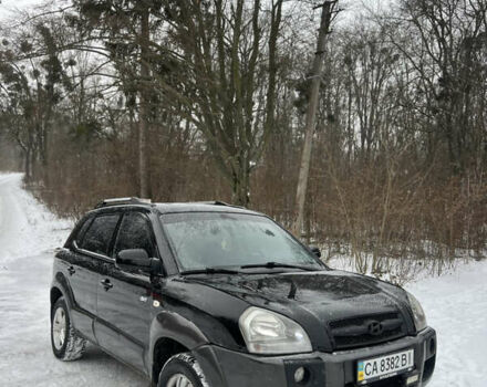 Черный Хендай Туксон, объемом двигателя 2 л и пробегом 291 тыс. км за 6800 $, фото 1 на Automoto.ua