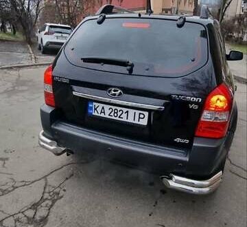 Черный Хендай Туксон, объемом двигателя 2.66 л и пробегом 311 тыс. км за 7200 $, фото 1 на Automoto.ua