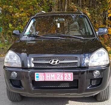 Черный Хендай Туксон, объемом двигателя 2 л и пробегом 217 тыс. км за 7400 $, фото 1 на Automoto.ua