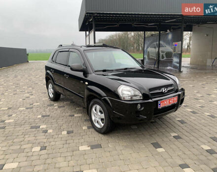 Черный Хендай Туксон, объемом двигателя 2 л и пробегом 198 тыс. км за 7500 $, фото 1 на Automoto.ua
