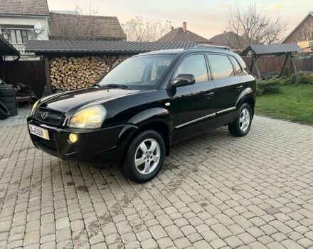 Черный Хендай Туксон, объемом двигателя 2 л и пробегом 276 тыс. км за 6950 $, фото 1 на Automoto.ua