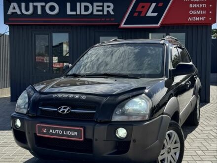 Черный Хендай Туксон, объемом двигателя 2 л и пробегом 163 тыс. км за 8900 $, фото 1 на Automoto.ua