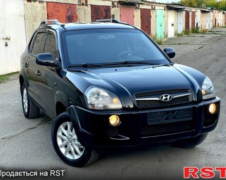 Черный Хендай Туксон, объемом двигателя 2 л и пробегом 167 тыс. км за 6800 $, фото 1 на Automoto.ua