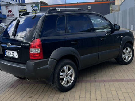 Черный Хендай Туксон, объемом двигателя 2 л и пробегом 322 тыс. км за 7700 $, фото 1 на Automoto.ua