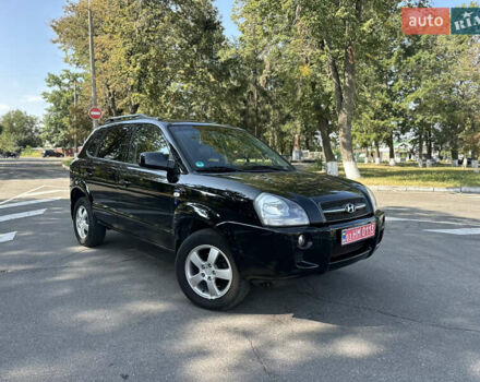 Черный Хендай Туксон, объемом двигателя 2 л и пробегом 185 тыс. км за 8450 $, фото 1 на Automoto.ua