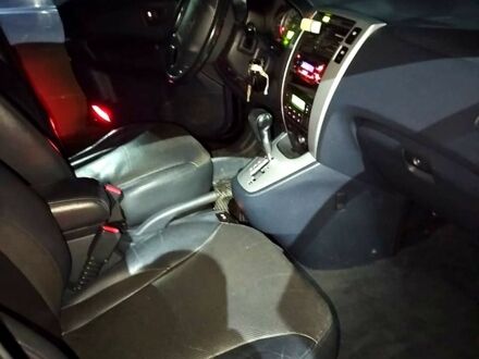 Чорний Хендай Туксон, об'ємом двигуна 2 л та пробігом 226 тис. км за 4720 $, фото 1 на Automoto.ua