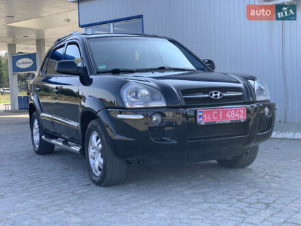 Черный Хендай Туксон, объемом двигателя 2 л и пробегом 220 тыс. км за 8700 $, фото 1 на Automoto.ua