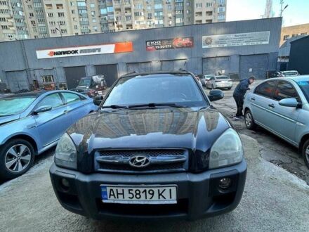Черный Хендай Туксон, объемом двигателя 2 л и пробегом 220 тыс. км за 7000 $, фото 1 на Automoto.ua